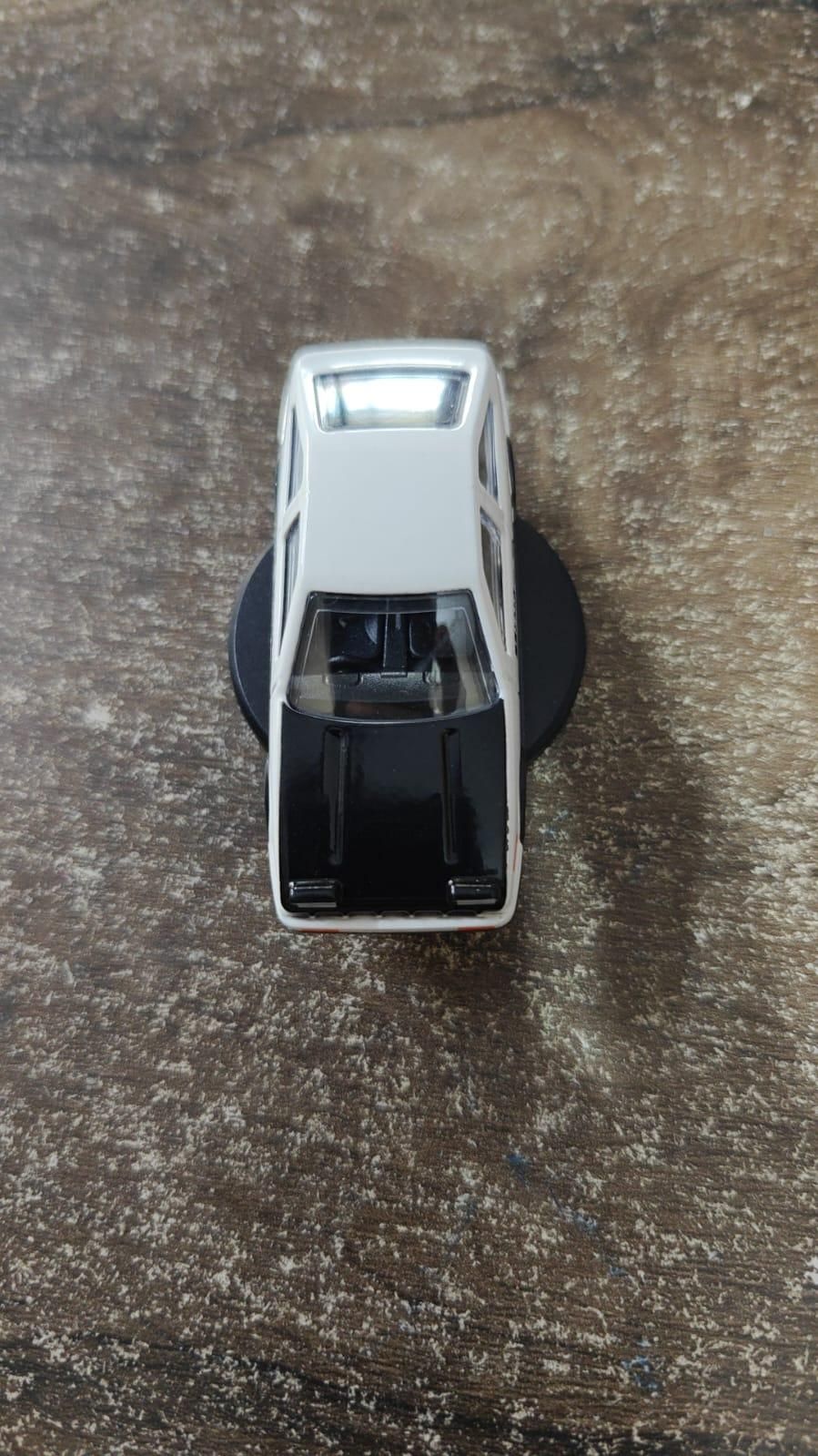 DRIFTING CAR STATUE ON CAR DASHBOARD